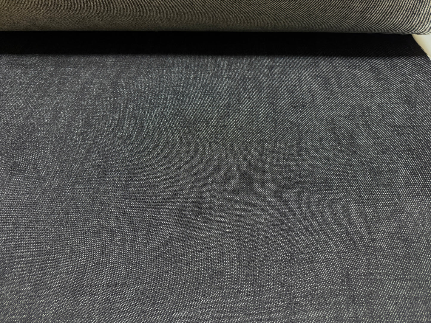 Okayama Denim 20 oz Japanese heavy ounce indigo selvage denim fabric showcasing rich texture and depth.