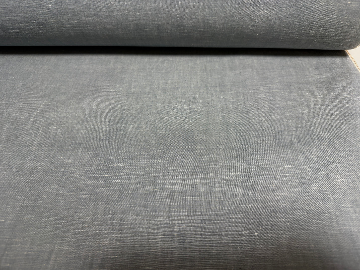 Okayama Denim fabric in grayish-blue slub chambray, perfect for various sewing projects.