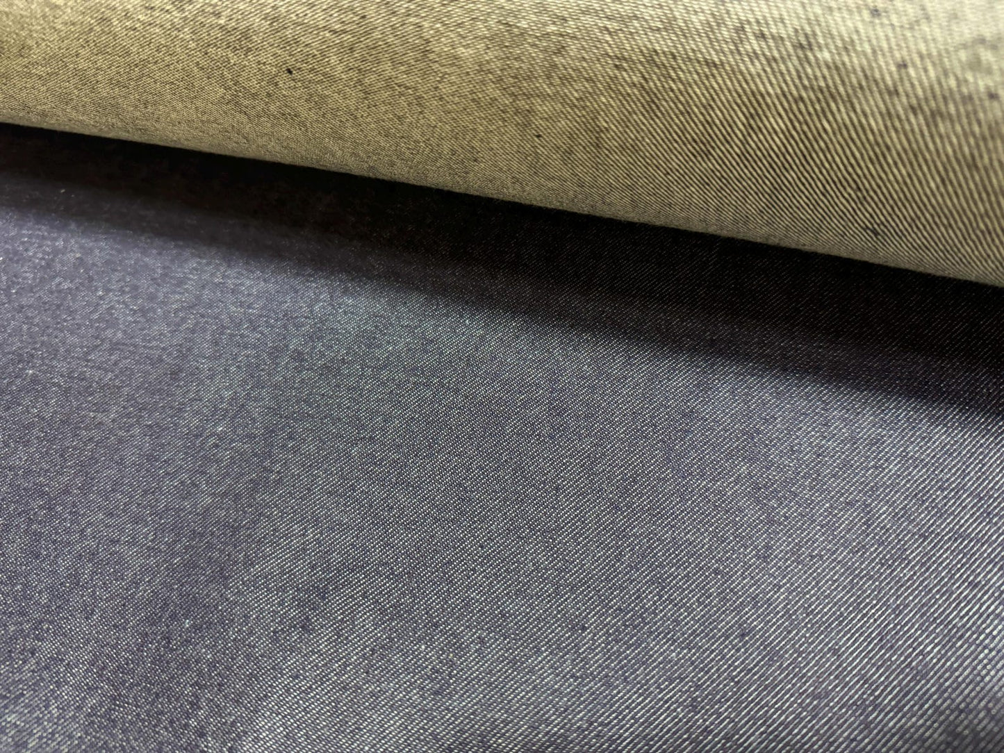 Okayama Denim | 10.5 oz Japanese Indigo Selvage Denim showing dark indigo and light textile textures.