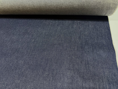 Okayama Denim 13 oz Japanese Indigo Kibata Selvage Denim fabric showing rich dark blue texture.