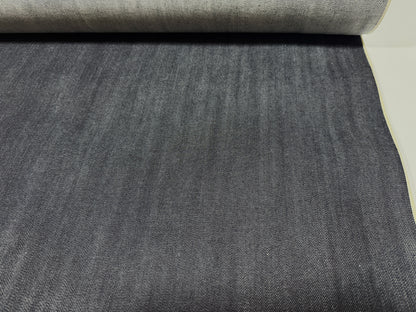 Okayama Denim | 12.5 oz Indigo Japanese selvage denim fabric roll showcasing dark blue texture