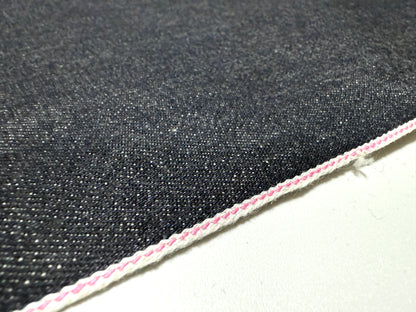 Okayama Denim 13.5oz indigo kibata Japanese selvage fabric yard with pink selvage detail.