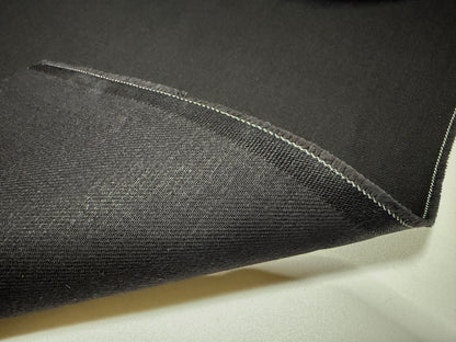 Okayama Denim | 13.3oz double width double-sided black denim fabric showing twill texture and finish.
