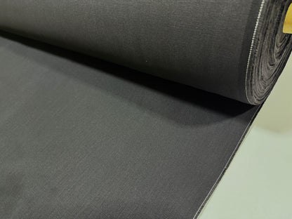 Okayama Denim | 13.3oz Double Width Double-Sided Black denim fabric roll showcasing its smooth texture and dark color.