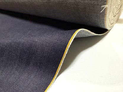 Okayama Denim | 13 oz indigo kibata Japanese selvage denim fabric yard with yellow selvage edge.