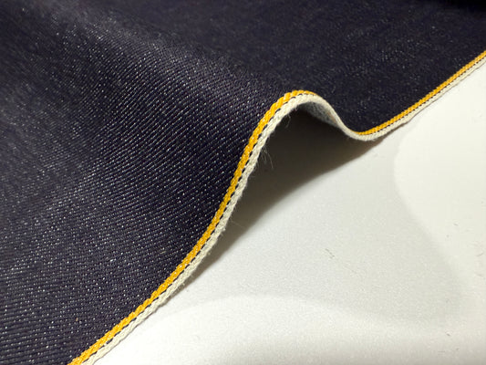 Okayama Denim 13 oz Indigo Kibata Japanese selvage denim fabric with yellow selvage detail, showcasing premium quality.