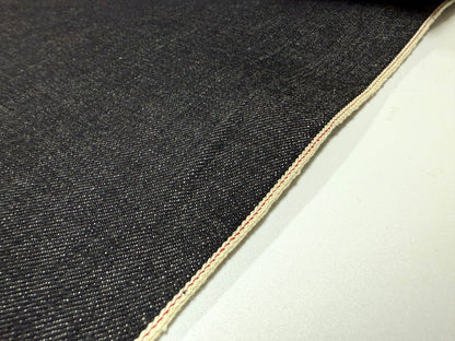 Okayama Denim 16.5 oz Japanese Heavy Ounce Indigo Selvage denim showcasing the selvedge edge and texture.