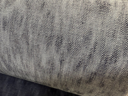 Close-up of Okayama Denim 16.5oz Japanese Indigo uneven dyed slab selvage denim texture.