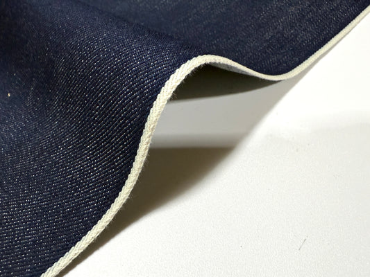 Okayama Denim | 15oz Indigo Selvage Japanese Blue fabric showcasing its smooth texture and selvage edge.