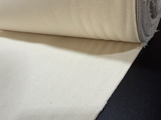 Okayama Denim 13 oz Ecru Selvage fabric showing soft and durable texture suitable for clothing.