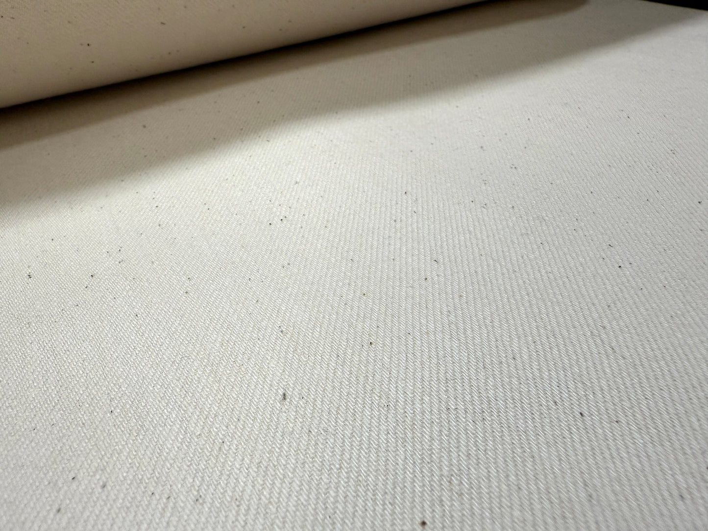 Okayama Denim 13 oz Ecru Selvedge Japanese Denim fabric texture detail, showcasing its quality and craftsmanship.