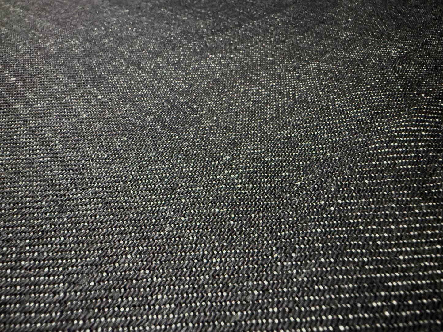 Okayama Denim 20 oz heavy ounce Japanese selvage denim fabric with rich indigo texture.