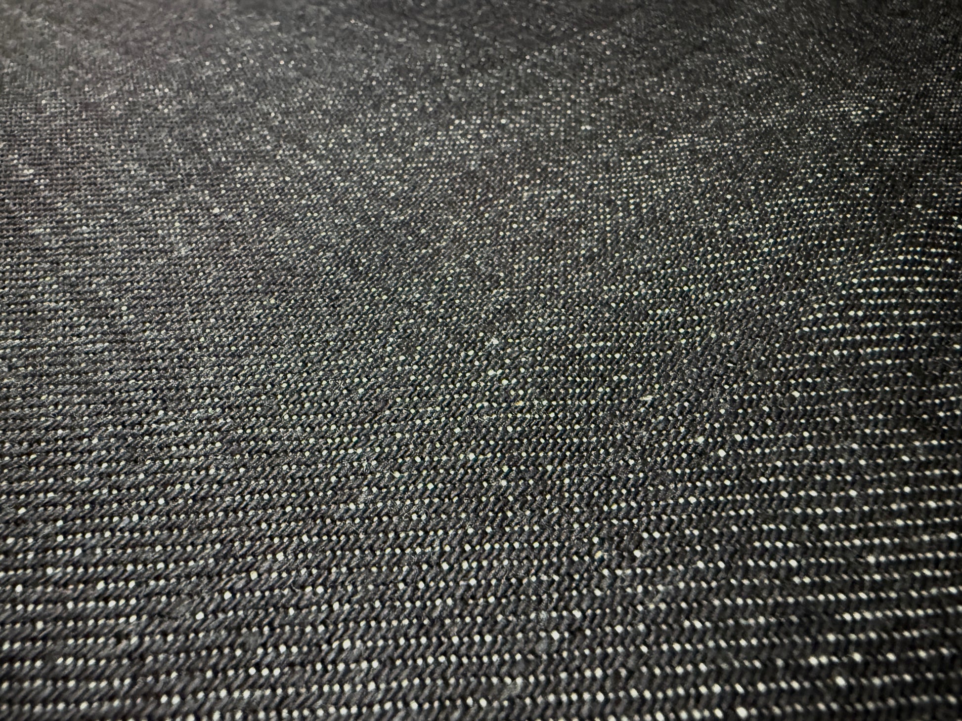 Okayama Denim 20 oz heavy ounce Japanese selvage denim fabric with rich indigo texture.