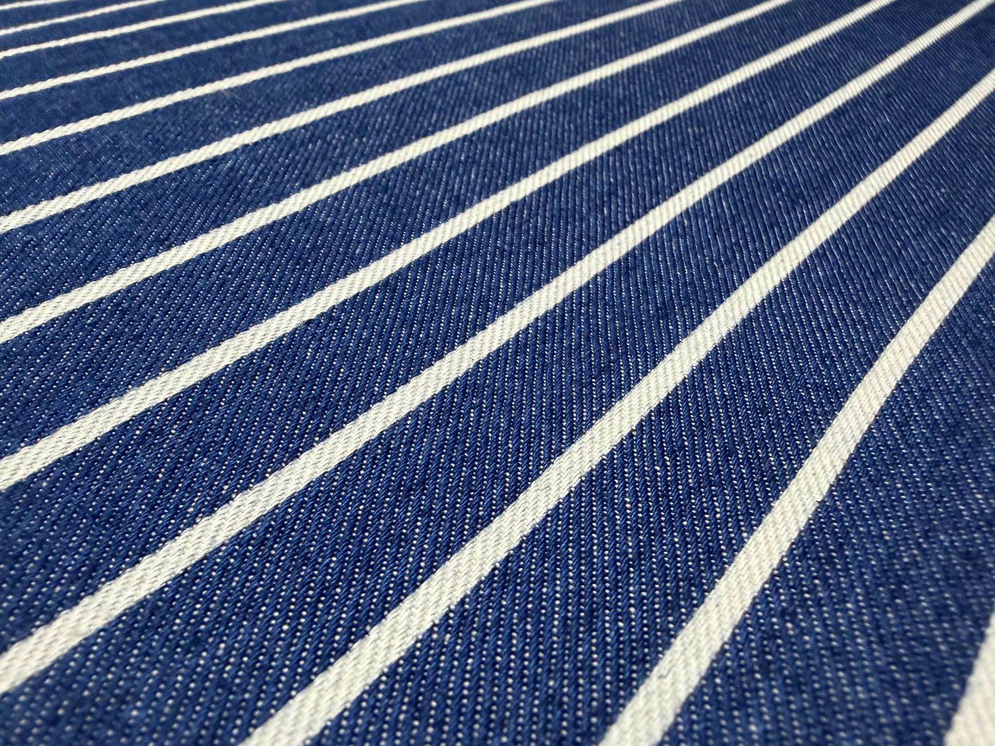 Okayama Denim fabric featuring Japanese indigo cotton discharge printing stripes by the yard.