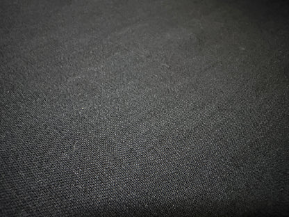 Close-up of Okayama Fabric, a 6.5 oz double-sided black shirt-weight fabric, perfect for refined shirts.