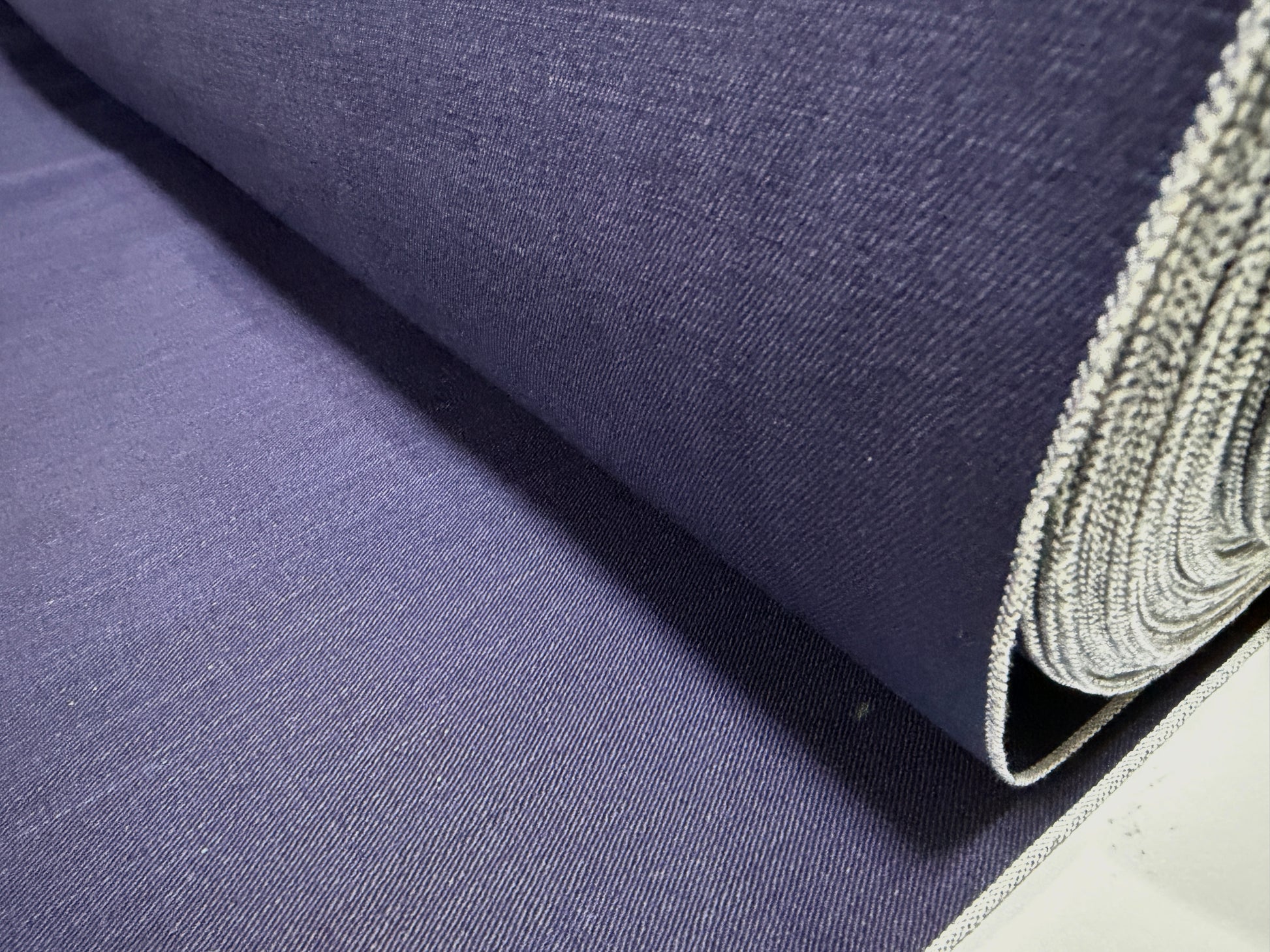 Close-up of Okayama Fabric, 6.5 oz double-sided indigo shirt-weight fabric for sewing.