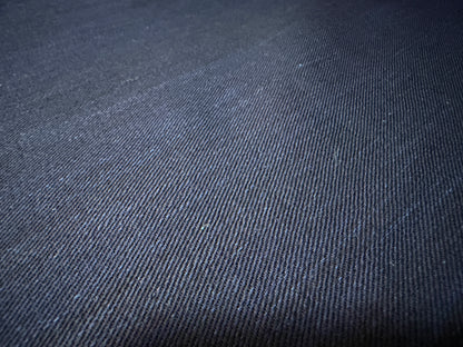 Okayama Denim fabric texture showcasing dark indigo color and soft surface, perfect for shirt-making.