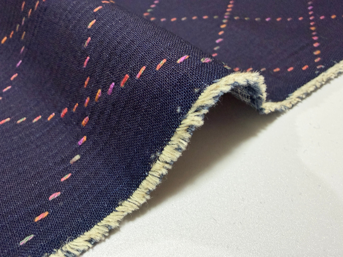 Okayama Denim 7 oz Sashiko Big Diamond Cotton Fabric with colorful stitching by the yard.
