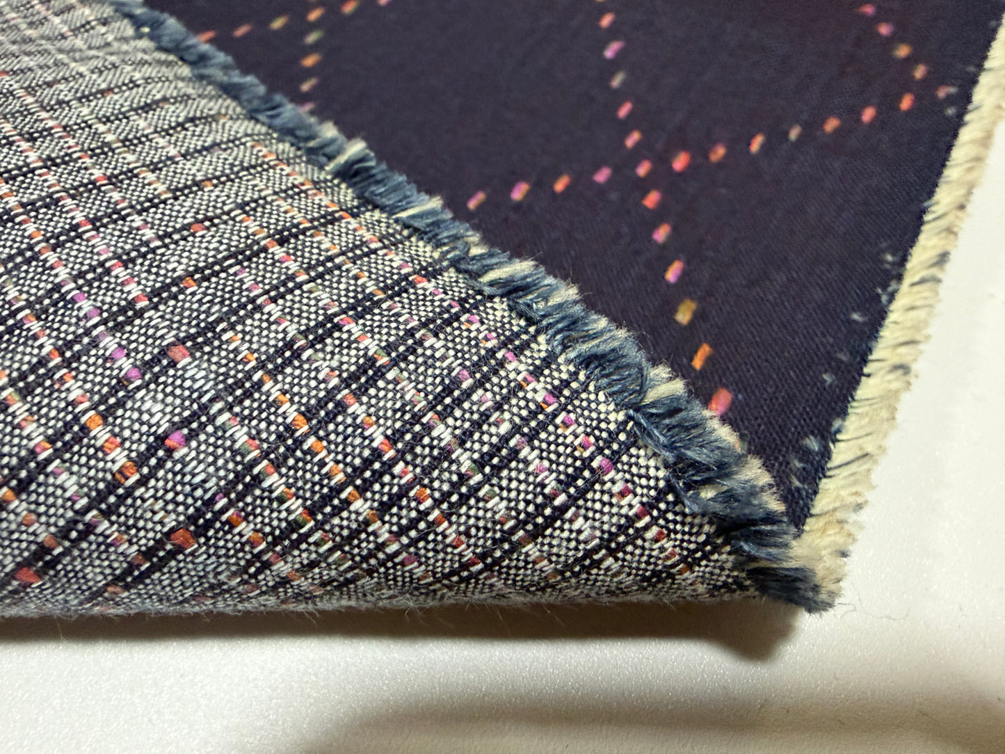 Okayama Denim 7 oz Sashiko "Big Diamond" Cotton Fabric showing colorful stitching and textured design.