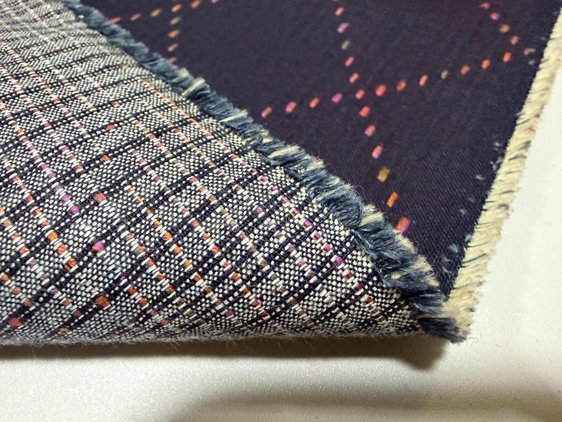 Okayama Denim 7 oz Sashiko "Big Diamond" Cotton Fabric showing colorful stitching and textured design.