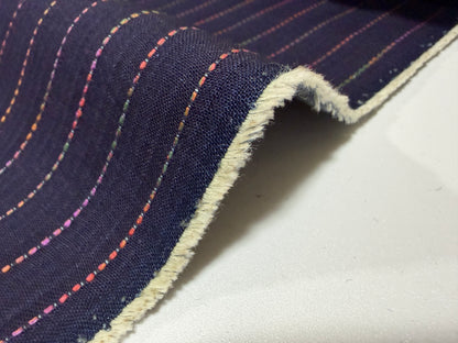 Okayama Denim 7 oz Sashiko stripes cotton fabric showcasing colorful stitching and soft texture.