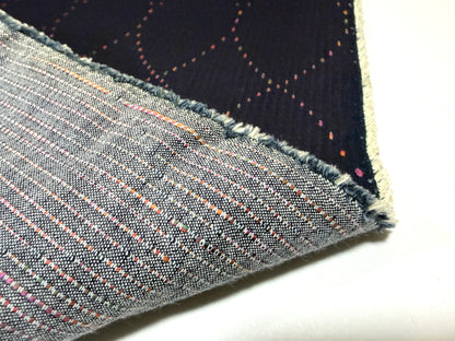 Okayama Denim 7 oz Sashiko Diamond Lattice Cotton Fabric showcasing colorful stitching and soft texture.