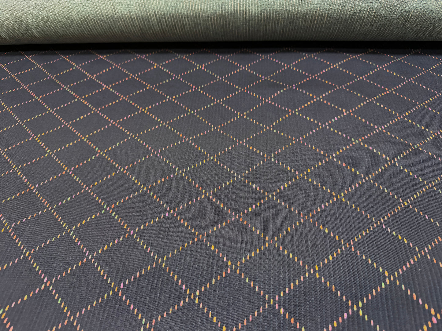 Okayama Denim 7 oz Sashiko fabric with colorful small diamond pattern by the yard, perfect for sewing and crafting projects.