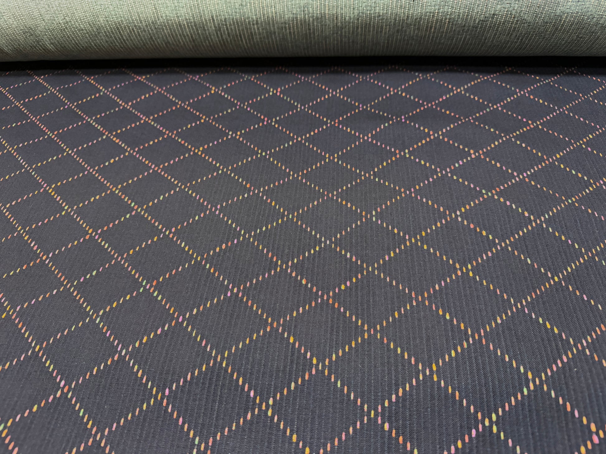 Okayama Denim 7 oz Sashiko fabric with colorful small diamond pattern by the yard, perfect for sewing and crafting projects.