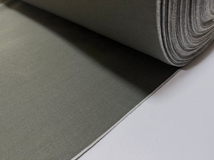 Okayama Denim 7.5 oz Japanese cotton olive dungaree fabric roll by the yard, featuring a traditional selvage edge.