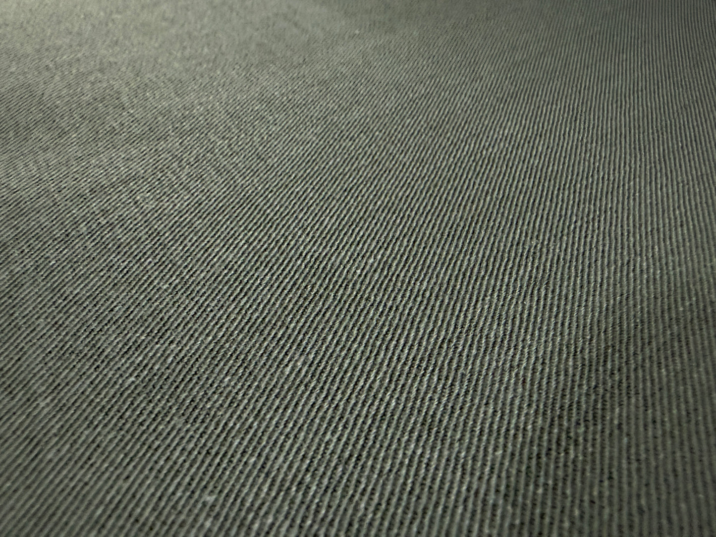 Okayama Denim 7.5 oz Japanese cotton olive dungaree fabric close-up texture