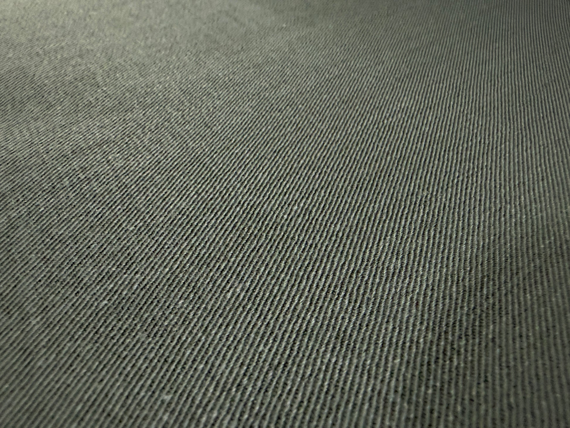 Okayama Denim 7.5 oz Japanese cotton olive dungaree fabric close-up texture