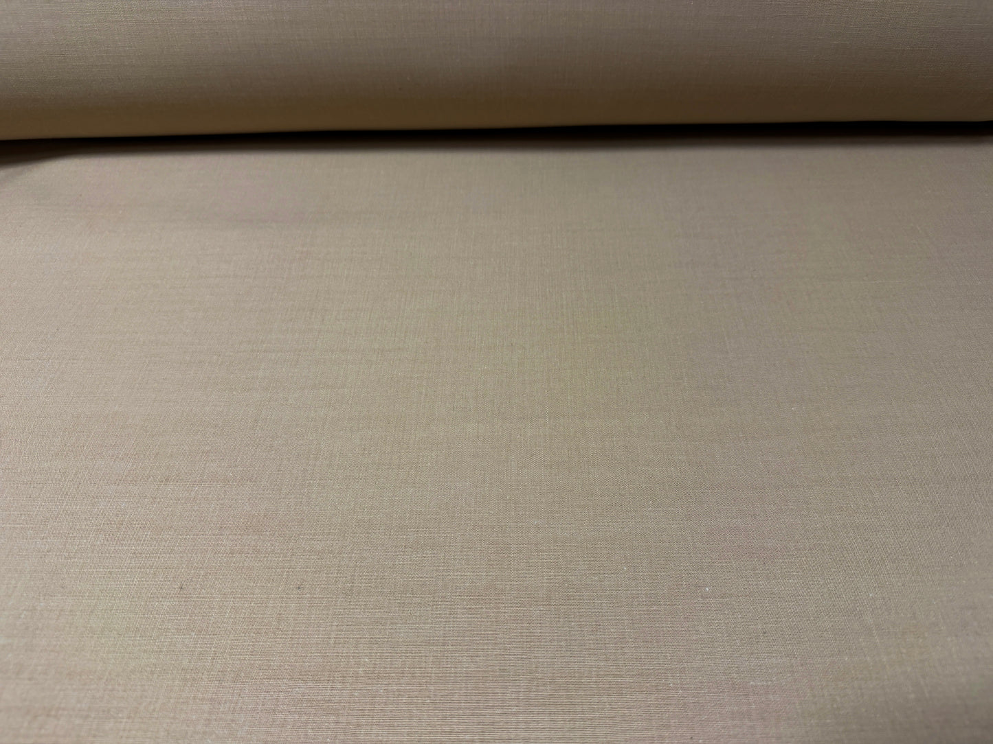 Okayama Denim 8 oz Japanese cotton beige dungaree fabric, showcasing a smooth and durable texture.