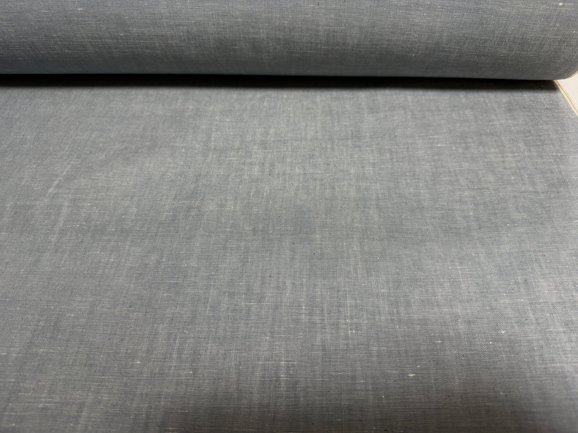 Okayama Denim fabric in grayish-blue slub chambray, perfect for various sewing projects.