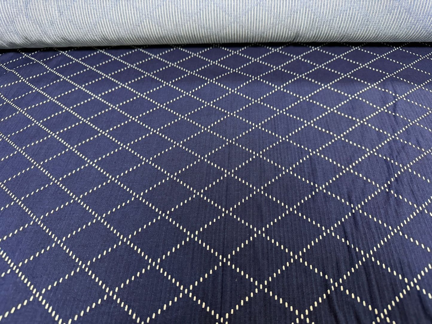 Okayama Denim - 7 oz blue & white sashiko cotton fabric with unique diamond pattern.