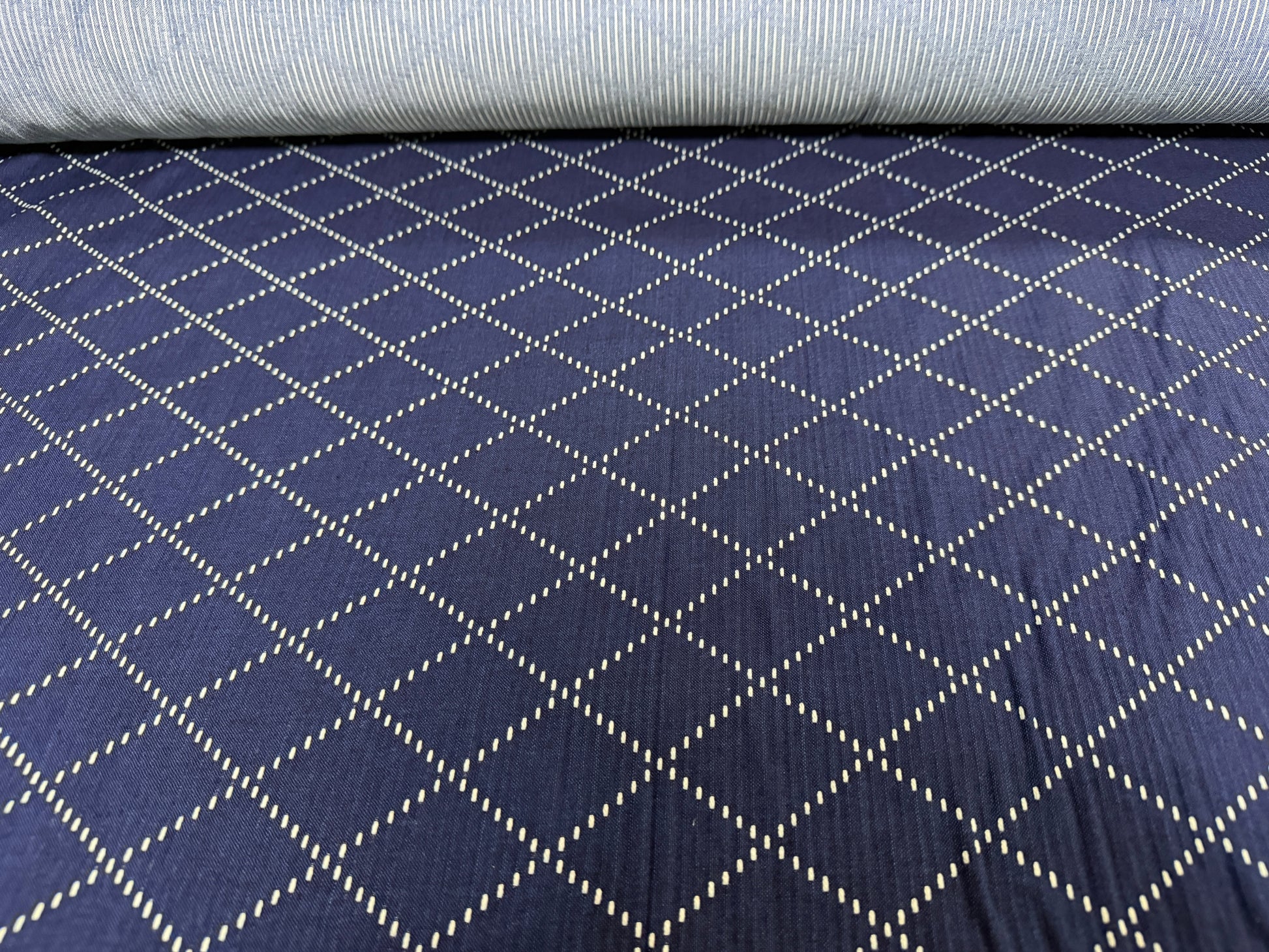 Okayama Denim - 7 oz blue & white sashiko cotton fabric with unique diamond pattern.