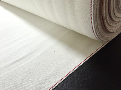 Okayama Denim rare 9.5 oz selvage plane weave cotton fabric by the yard, showcasing a soft natural texture.