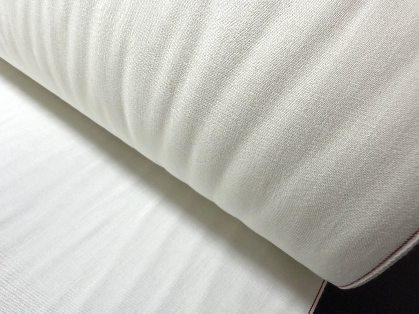 Okayama Denim | Rare 9.5 oz Selvage Plane Weave Cotton Fabric showcasing soft texture and natural finish.