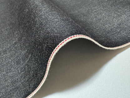 Okayama Denim 10.5 oz Japanese Cotton Black Selvage Denim fabric showing smooth texture and durable edge.