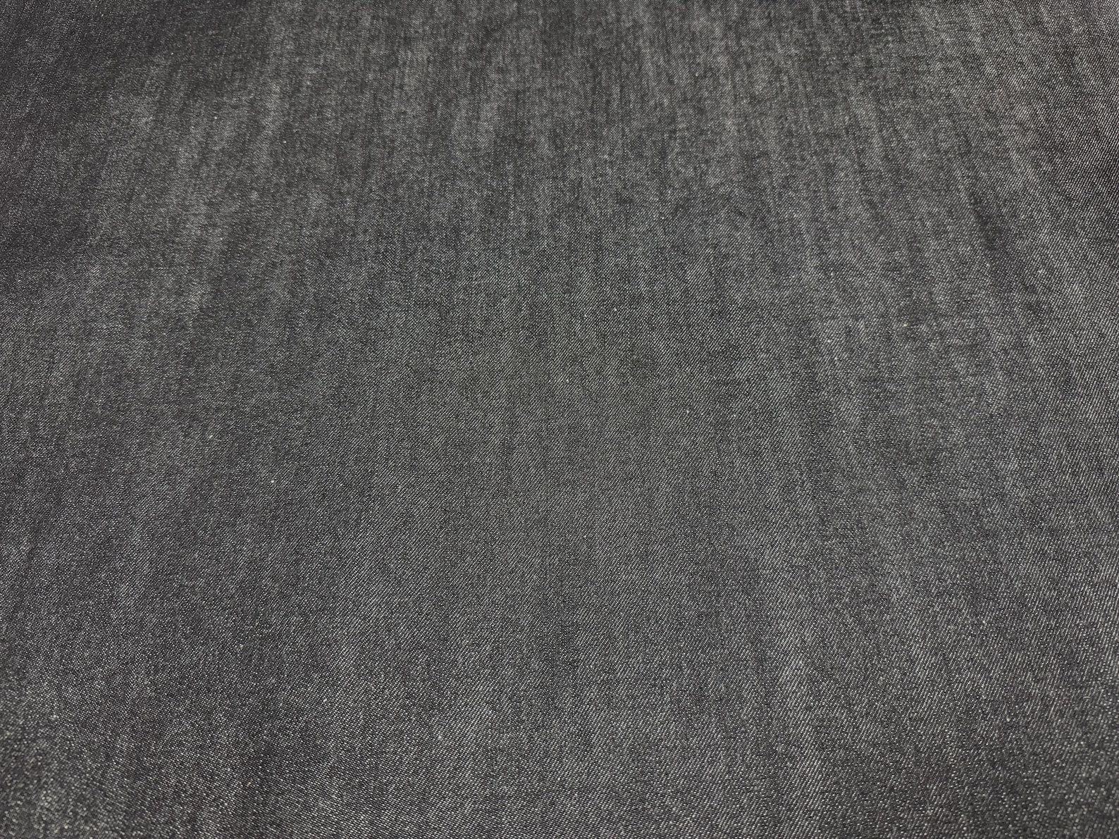 Okayama Denim 10.5 oz Japanese Cotton Black Selvage Denim fabric texture close-up