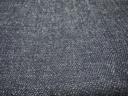 Okayama Denim | 12.5 oz Japanese Indigo Kibata Selvage Denim texture close-up showing intricate weave and quality.