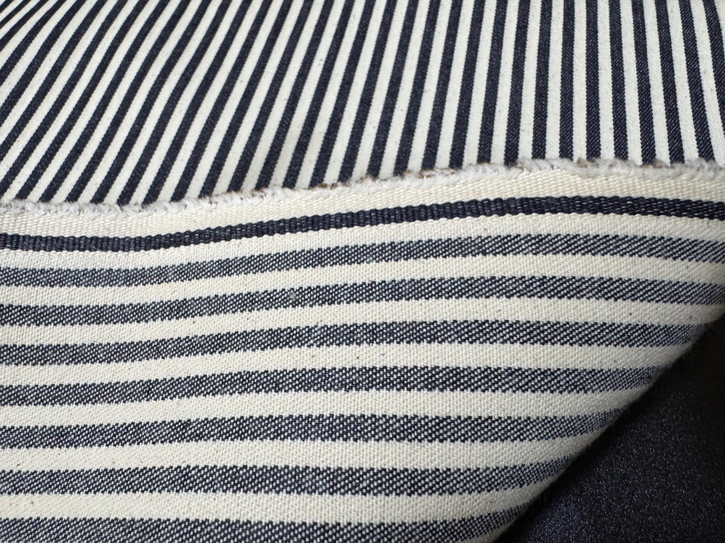 Okayama Denim | 10oz Double Width Indigo Hickory Fabric showing the striped pattern and texture of the high-quality denim.