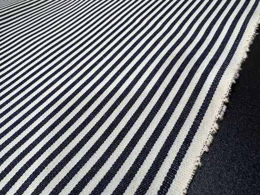 Okayama Denim - 10oz Double Width Indigo Hickory fabric with navy and cream stripes, ideal for sewing and crafting.
