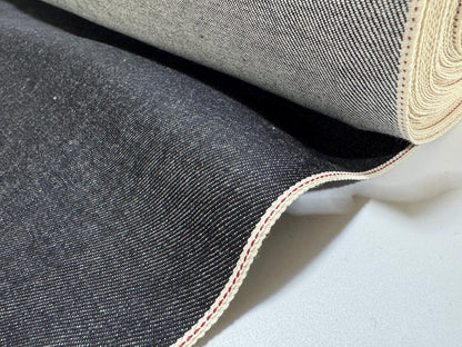 Okayama Denim 10.5 oz Japanese Cotton Black Selvage Denim fabric roll showcasing high-quality texture and durability.