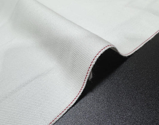 Okayama Denim fabric detail showcasing 13 oz White Selvedge with Red Edge, premium Japanese craftsmanship.