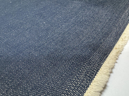 Okayama Denim | 12.5oz Double Width Indigo Japanese denim fabric close-up showing texture and color.