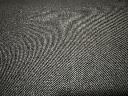 Okayama Denim | Close-up of 11oz double-sided black Japanese selvage fabric texture.