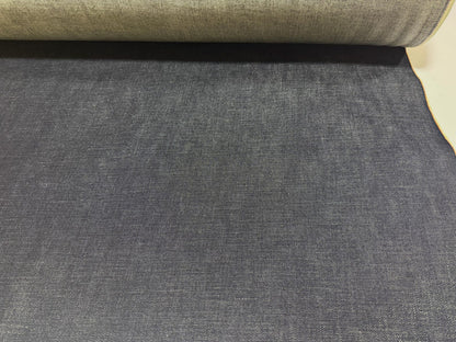 Okayama Denim fabric showing 13.5 oz indigo Japanese selvage denim with a smooth texture for apparel projects.