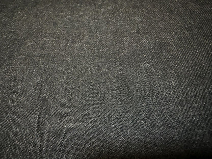 Okayama Denim fabric close-up, showcasing the texture of 13.5 oz black/gray Japanese selvage denim.