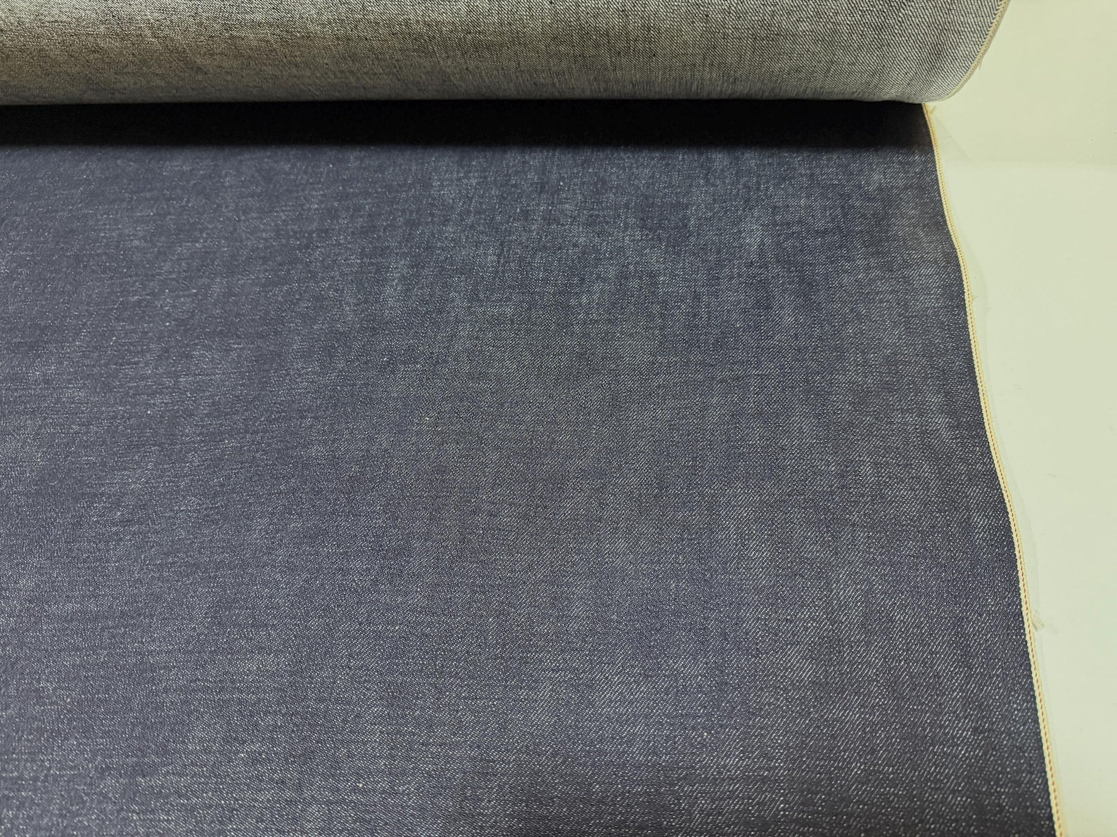 Okayama Denim 15.5oz indigo selvage Japanese blue fabric rolled out for premium apparel.