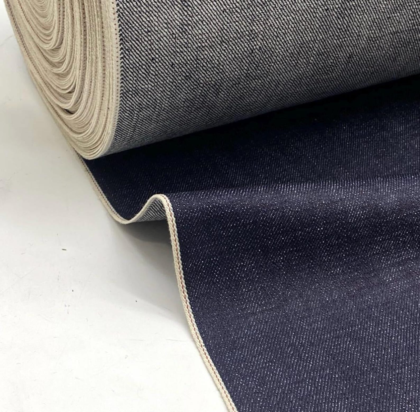 Okayama Denim 15.5oz indigo selvedge fabric roll with matching blue selvage edges